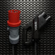 Red CEE industrial plug and CCS2 connector of a portable DC fast charger